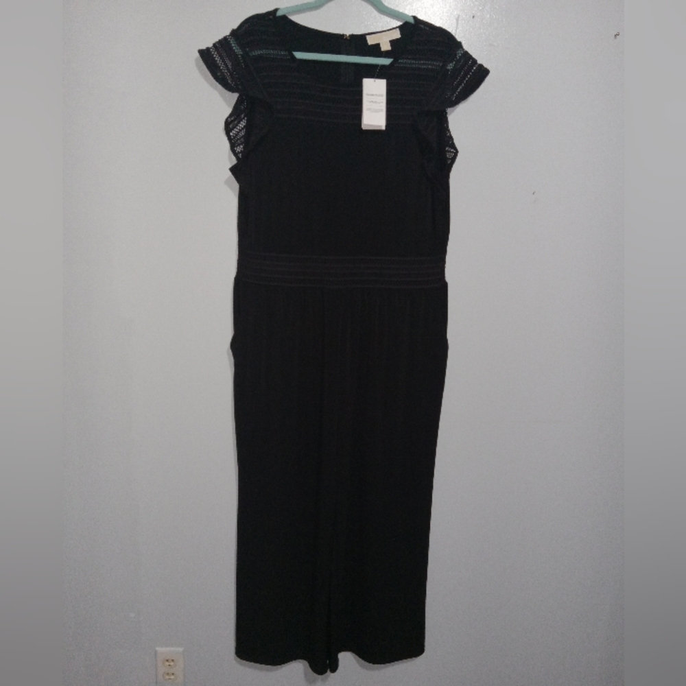 MICHAEL KORS BLACK JUMPSUIT SZ XL (HAS SMALL DEFECT IN THE THREADING ON TRIM)
